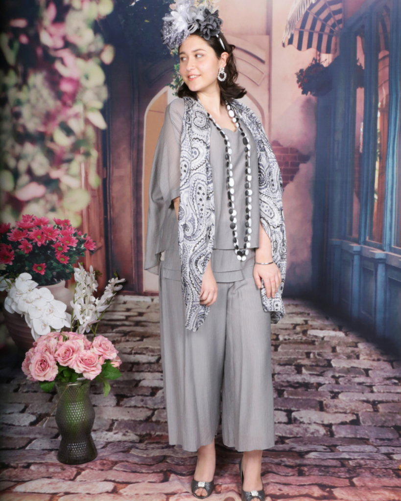 Silver twin set with a lined top and pants, featuring a sheer lightweight outer fabric, perfect for elegant racewear for ladies.